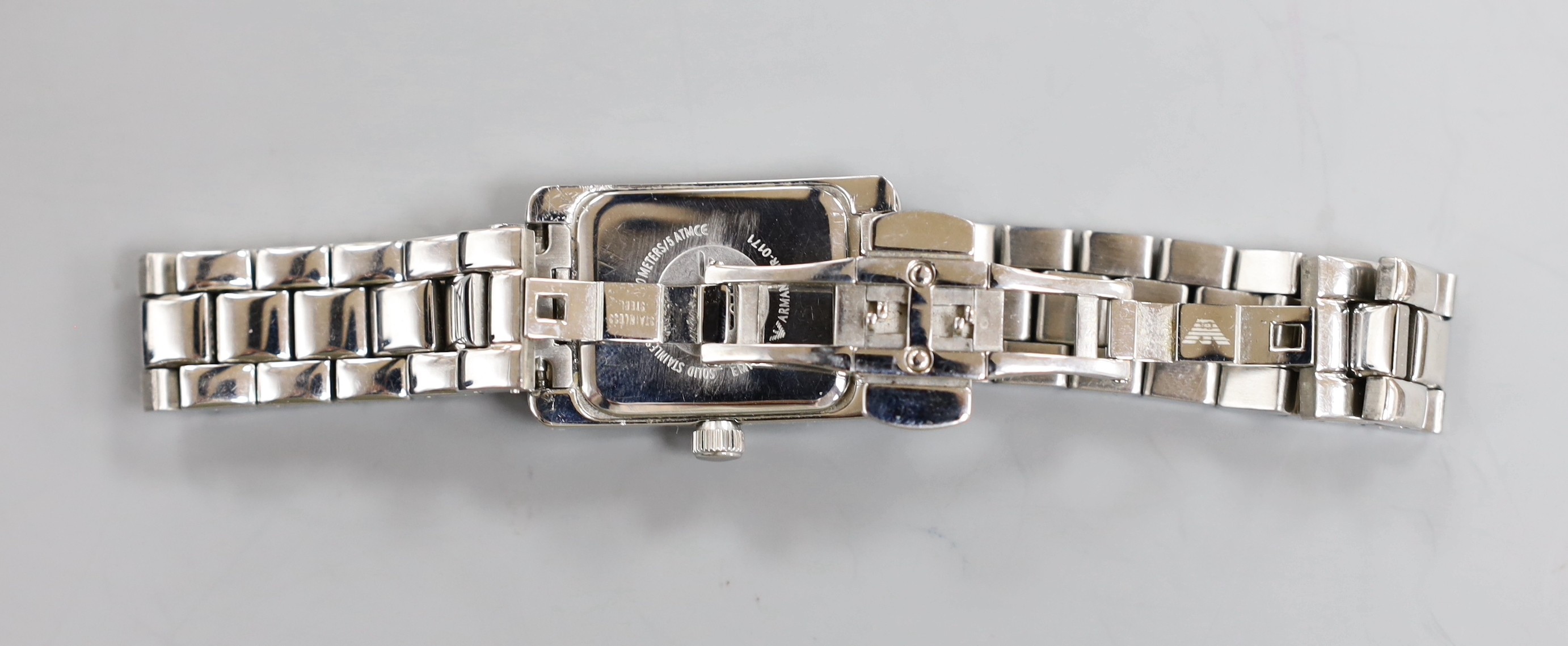 A lady's modern Emporio Armani quartz wrist watch, with mother of pearl dial and box.